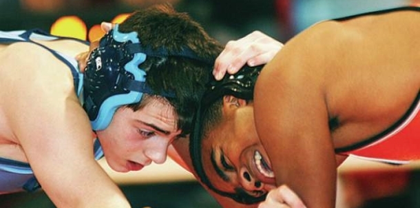 Manley Gets Firm Hold on Opponent in Kan/Okla Open Saturday