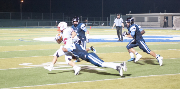 Bruin Defense Drags Down Kelley Runner.