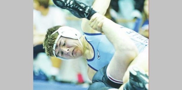 Bruins Wrestler goes for the Pin!