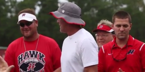 Brett Favre mingles with the HHS staff