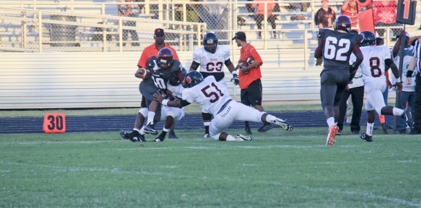 TROJANS TRAMPLE VIKINGS!
