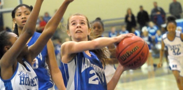 Bryant White rides defense to win over Bryant Blue in seventh-grade girls game