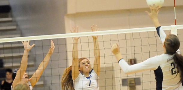 Lady Hornets persevere, come back from the edge to win