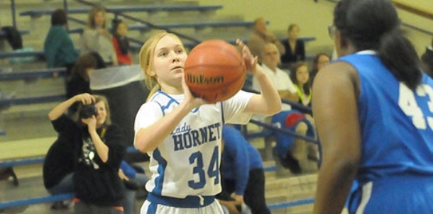 Taylor’s work on the boards helps spark Bryant White to victory