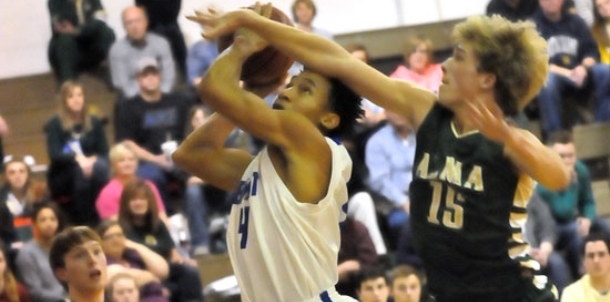 Alma fends off Bryant after burst to open second half