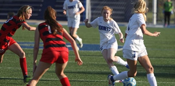 Bryant girls challenge league leaders but fall 2-1