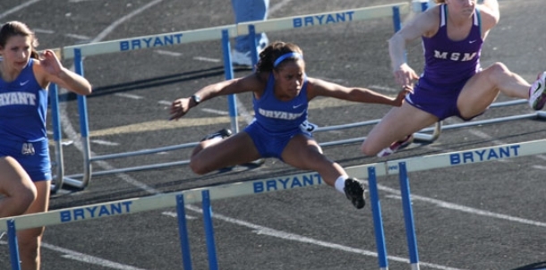 Lady Hornets surprise coach, competition with home meet triumph
