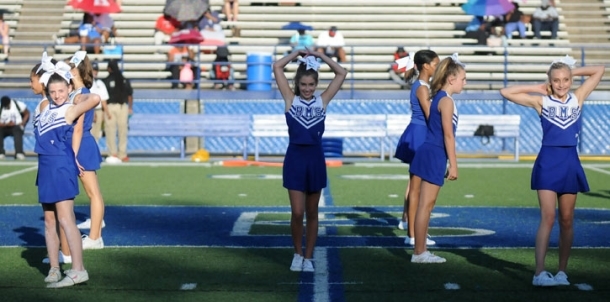 Seventh grade dance, cheer perform at halftime