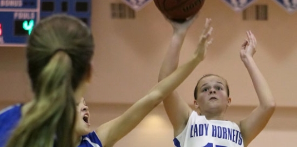 Conway White tops freshman Lady Hornets for third at Invitational