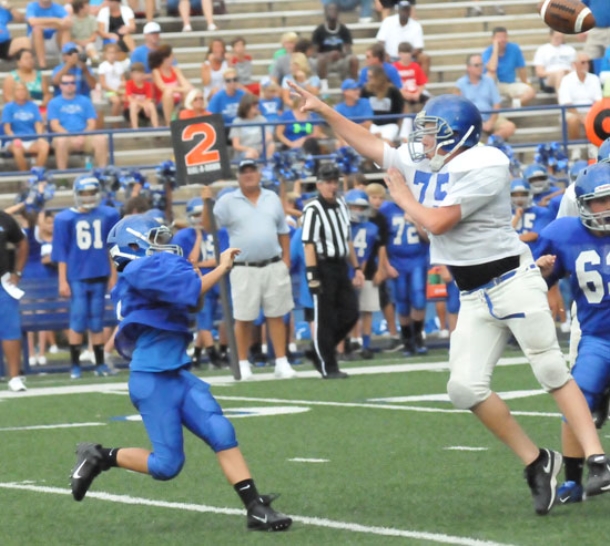 Late touchdown pass carries Blue past White in seventh grade battle
