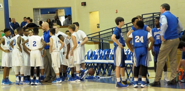 Bryant White hangs on to edge Bryant Blue in seventh-grade boys battle