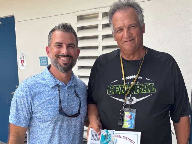 Coach Pusateri with Hernando County District Athletic Director Dustin Kupcik