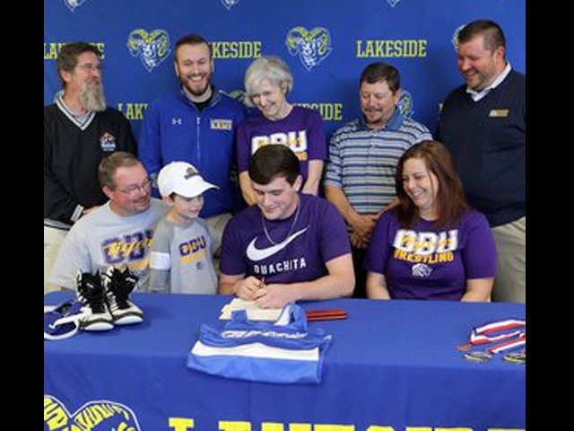 Spellings lives out college dream, signs with OBU
