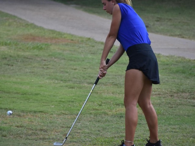 Harrison claims a pair of golf wins