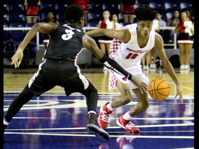 Grizzlies roll past Robinson in Coke Classic opener