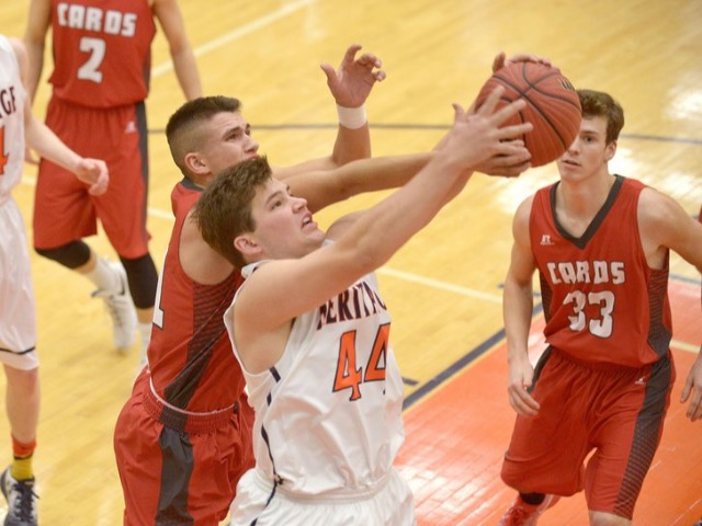Farmington splits with Heritage