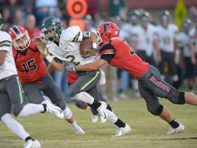 Alma hands Farmington first conference loss
