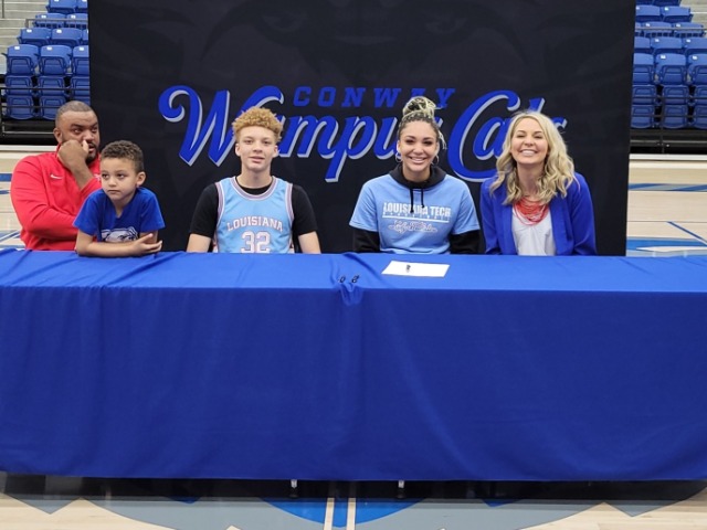Parker, Taylor sign with college programs