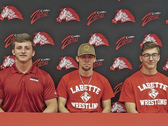 Claremore wrestling trio signs letters of intent