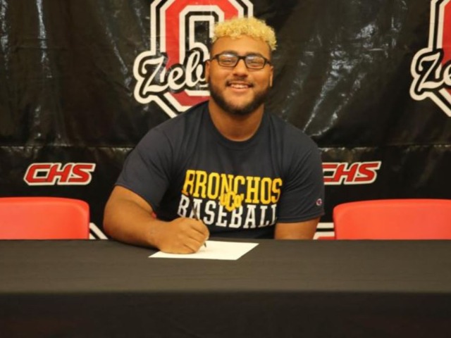 Claremore High?School graduate Noah Grimett signs his national letter of intent