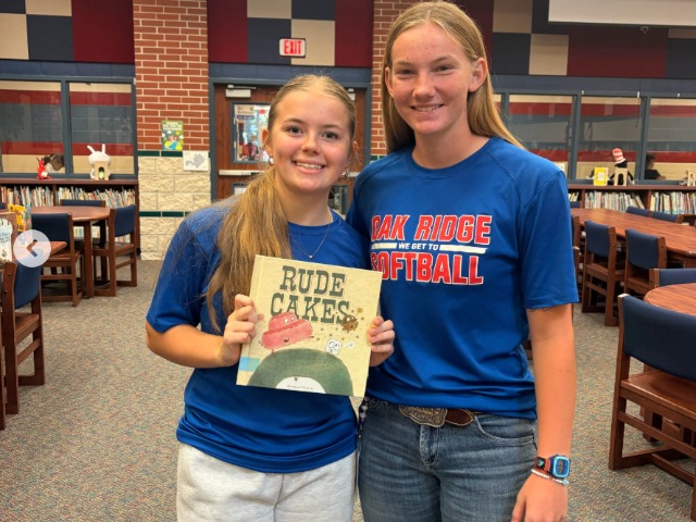 Softball Swaps Bats for Books 