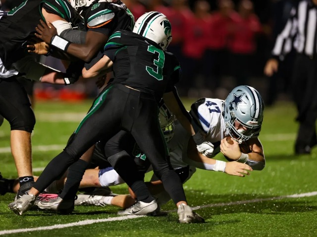 Bombers tame Wildcats 14-7, clinch Playoff Berth