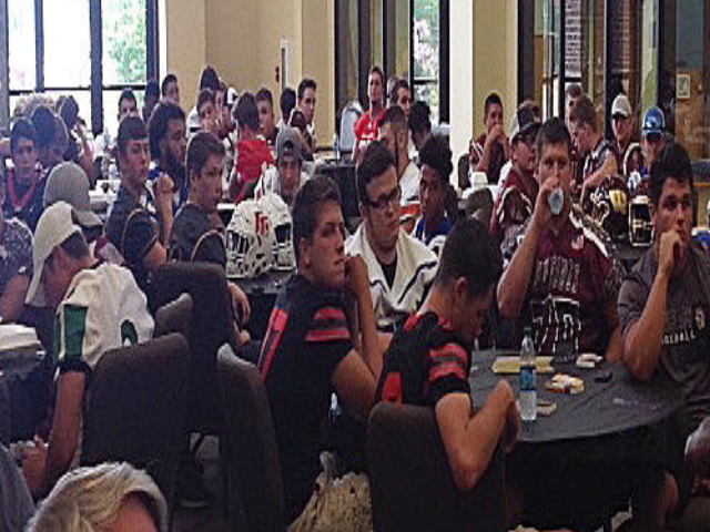 Prep football teams participate in annual get-together with the press