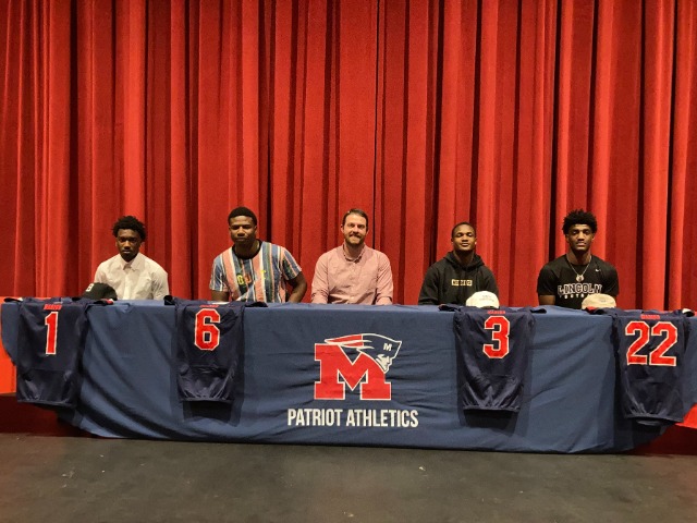 Four Marion football players sign letters of intent