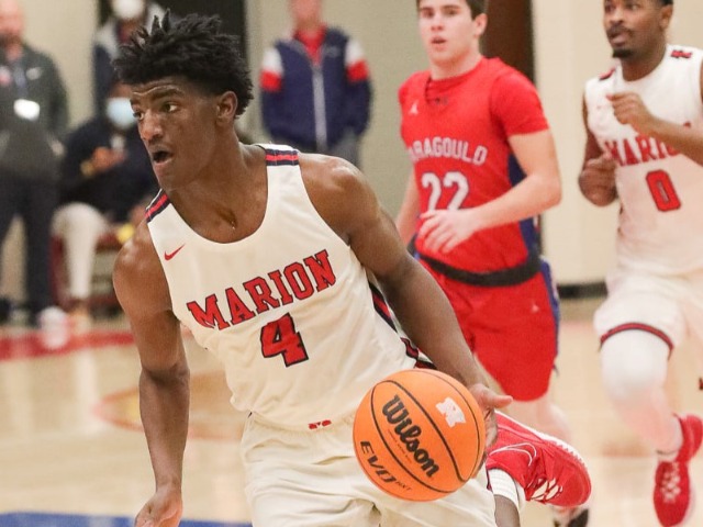 Marion runs past Searcy