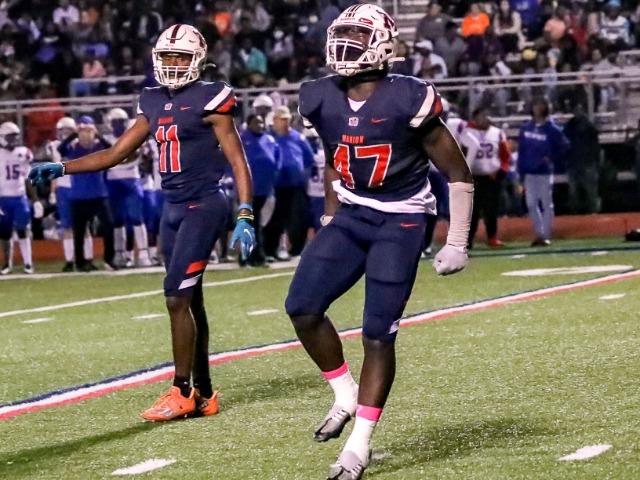 Marion seeks share of league title Friday at Catholic