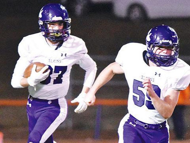 Elks rout Trojans