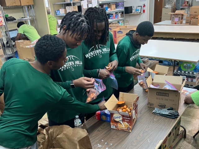 Cougar Hoops Volunteering at WH Church of Christ