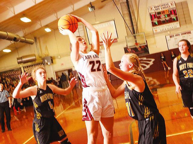 Lady Eagles split first two games