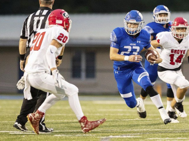 Grove runs past Miami 35-14 in Rotary Bowl