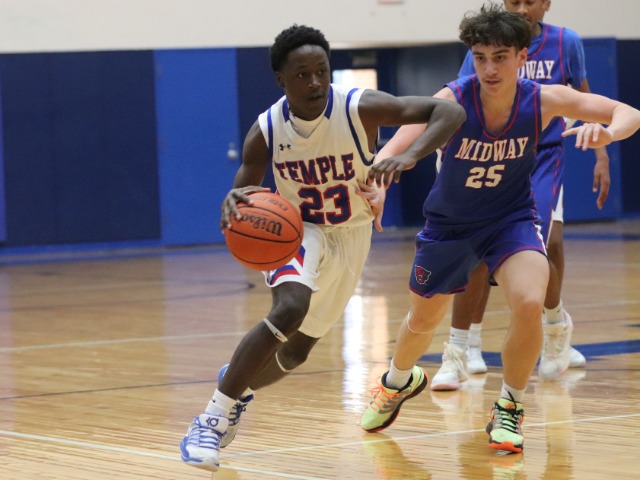 Jackson Leads Wildcats in Hard-Fought Contest Against Midway