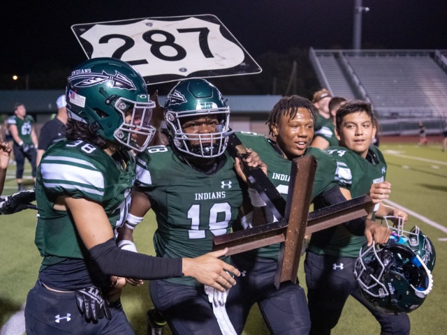 Waxahachie defense flexes, offense responds to rout Ennis in 101st Battle of 287