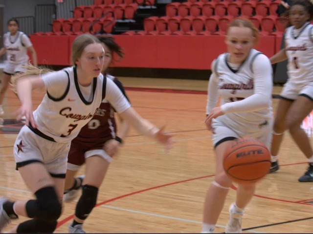 Cowboy wrestlers win the Round-Up and round up some canned goods.