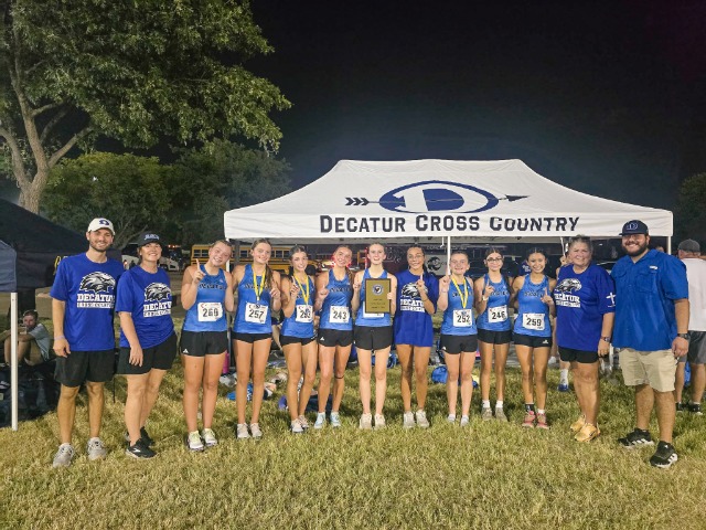 The Decatur Lady Eagles used four top 20 finishes to capture the team title at the 2026 Friday Night Hawk Invitational in Carrollton last week.