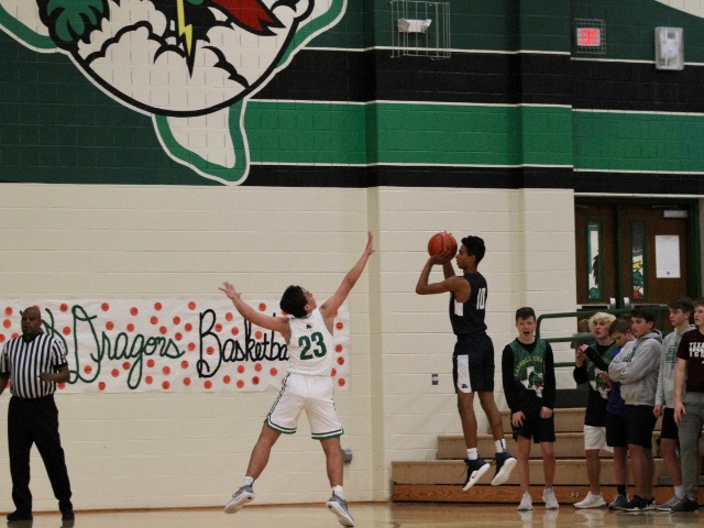 Dragon Basketball guts out 3rd straight district W