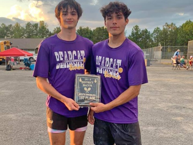 Tennis Cats Win District Tournament