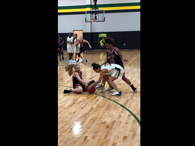  9th Grade Girls Basketball team defeats the LR Mills Lady Comets 30-23