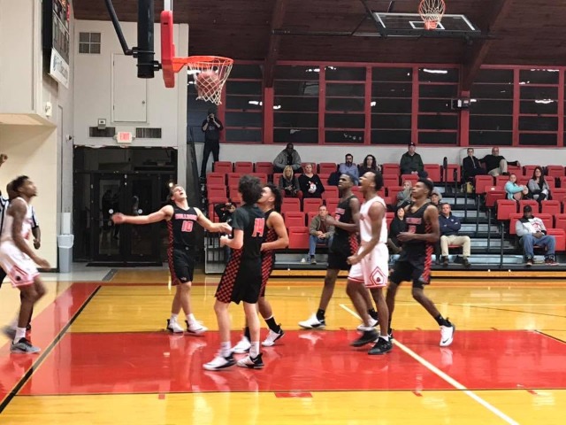 The HS Boys Basketball team falls to the Searcy Lions