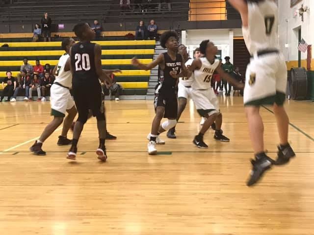  9th Grade Boys Basketball team defeats the LR Mills Comets in overtime 36-32