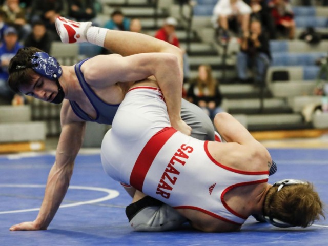 Wildcats eke out win over Warriors in dual