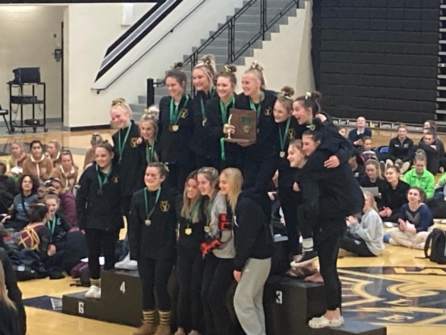 Gymnastics Team Claims First District Title Since 2014, State Bound!