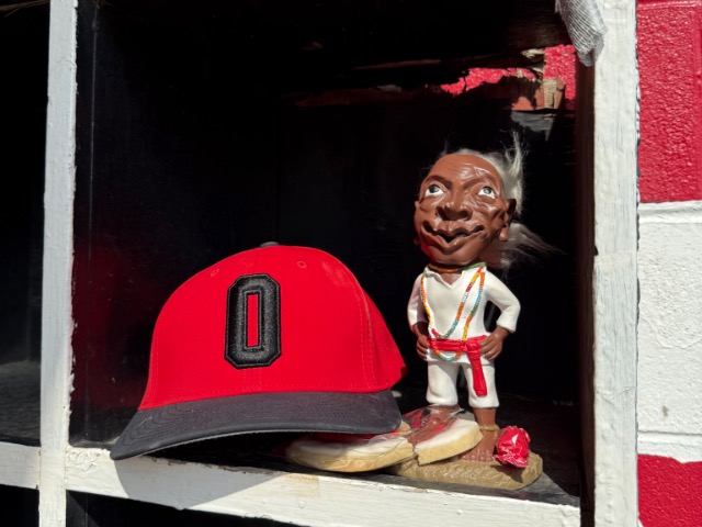 Jobu poses with Red Riders hat