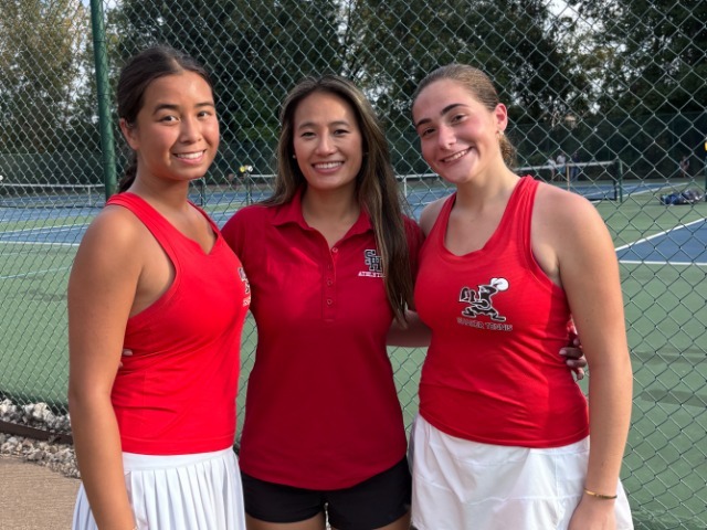 Girls Tennis Players and Coach