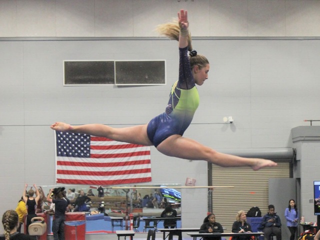 Gymnasts finish 1st on Day 1 of District Championships