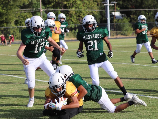 MUSTANGS MAGNIFICENT AT HOME: Travis Science Academy 7th Grade Football Tops Crosstown Rival Lamar 32-20