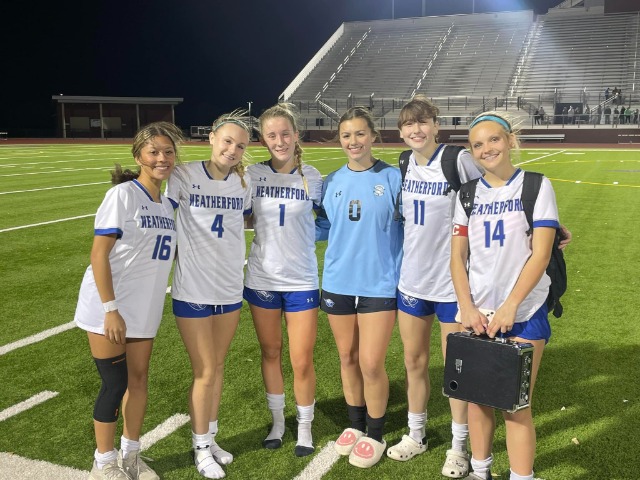 McElhaney Scores Two; Lady Roos Cruise